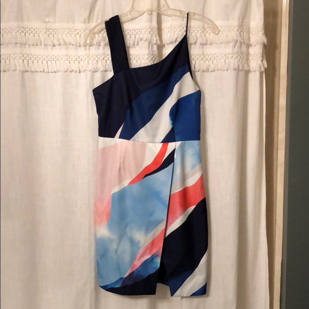 Beautiful dress with asymmetrical  top retail